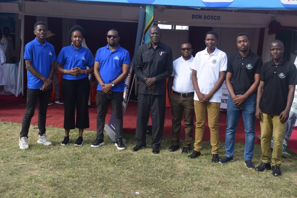 DBTTC staff and students at an exhibition